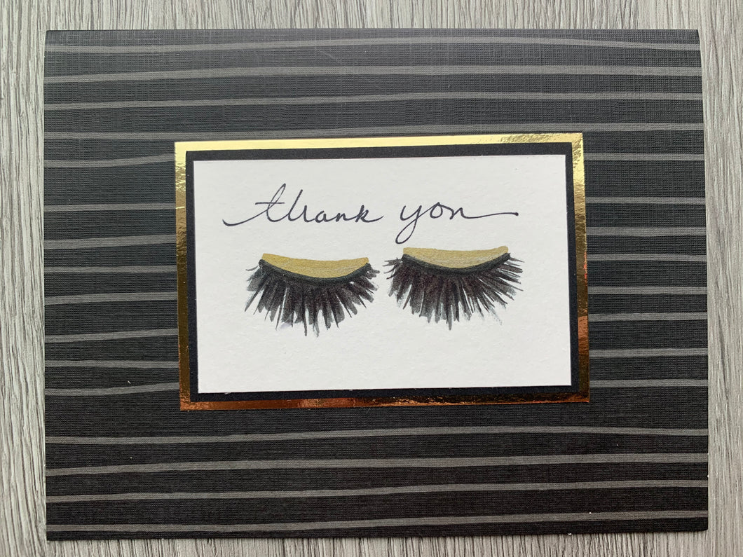 Thank you - gold & black lashes